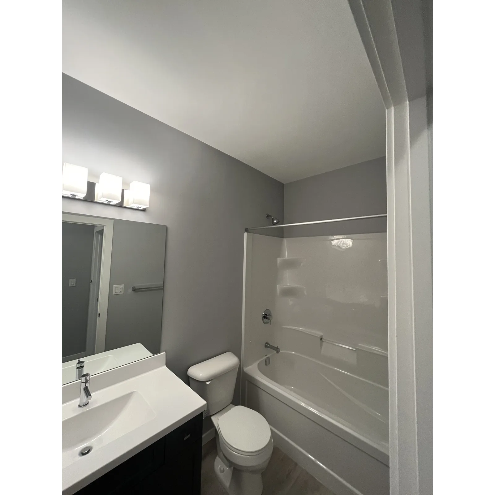 Bathroom fixtures and freshly painted surfaces